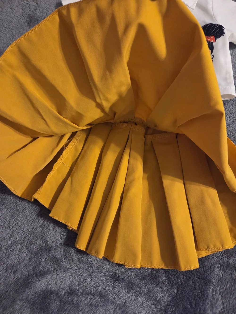 Girls White Graphic Crop Shirt with Mustard Yellow Pleated Skirt Set